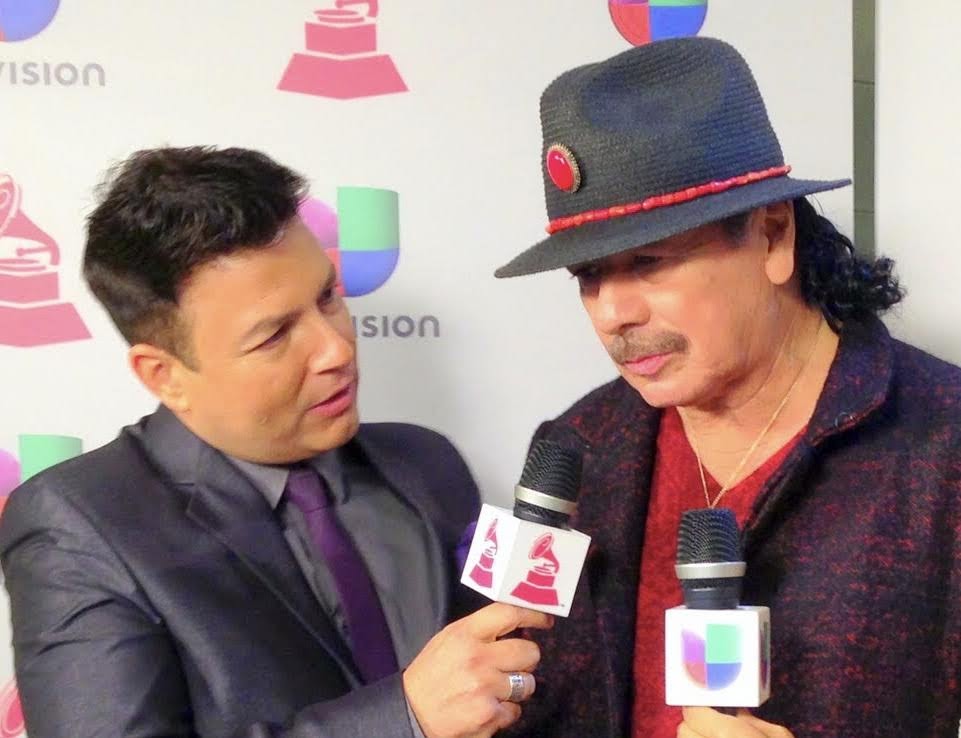 Kike Posada entrevistando a Carlos Santana en 2013